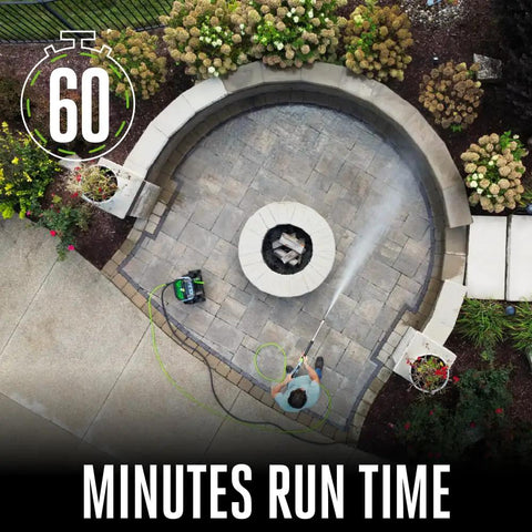 Top view of Dual 56V Battery Electric Pressure Washer With 3200 Psi Turbo Power in use on stone patio, showing 60 minutes run time.