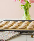 Heavy Duty PTFE Dehydrator Sheets 14 Inch Nonstick Baking Mats And Oven Liners For BBQ Hot Plate Reusable Heat Resistant Food Safe on tray with macarons.