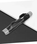 Black Golf Grip Trainer Pro Grade Swing Training Device on white and black surface