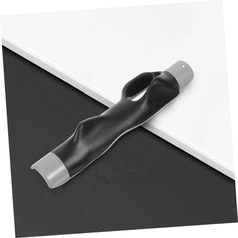 Black Golf Grip Trainer Pro Grade Swing Training Device on white and black surface