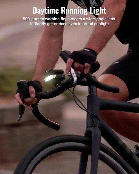 Cyclist riding with Ultra Bright 1100 Lumen Bike Headlight With 270 Degree Wide Beam Auto On Off 6 Modes Daytime Warning 46 Hour Run Time Compatible With Garmin Wahoo Bryton Computers For Night City Rides Ready To Roll on handlebars.