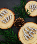 60 Piece Hammer Drive Rivets Aluminum Core Set With Round Head Blind Rivets on wooden discs with greenery