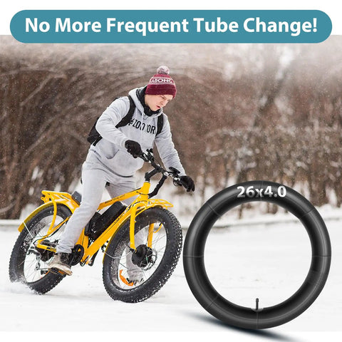 Rider on yellow fat bike, snow background, 2 Pack 26 x 4.0 Fat Tire Inner Tube With 32mm Schrader Valve Puncture Resistant