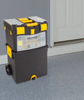 Rolling Tool Box With Wheels And Foldable Comfort Handle Removable Top And Deep Bottom Storage Stackable Organizers With 24 Compartments Two Removable Trays Cable Hooks For On The Go Tasks in a garage setting