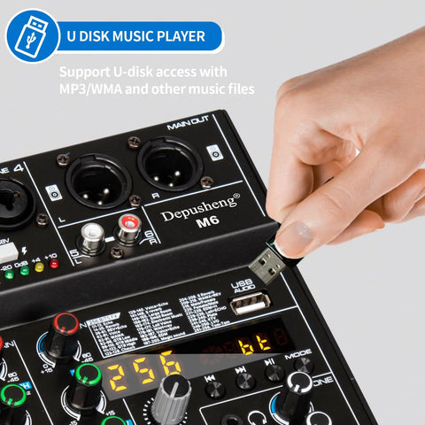 Hand inserting USB into 6 Channel DJ Mixer Portable Bluetooth MP3 Studio Console With 256 Digital Effects Dope DSP Engine