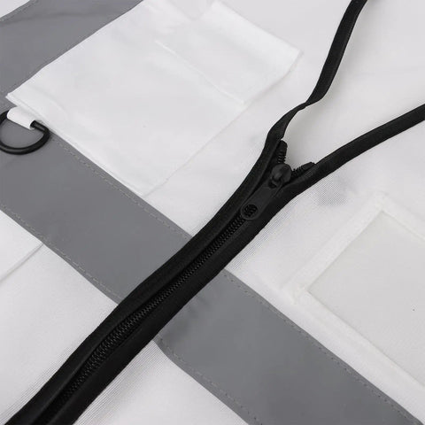 Close-up of White High Visibility Safety Vest With Five Handy Pockets And Hella Bright Two Inch Reflective Strips Ultra Light Breathable Build Designed For Crew Leaders And Daily Site Rounds Large, showing zipper and pockets.