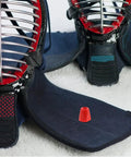 Beefed Up Stainless Steel And Plastic Nut Replacement For Fencing Gear And Tools, shows red nut on fencing equipment