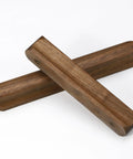 Two walnut wood drawer pulls with rounded edges, part of the Walnut Wood Drawer Pulls Set Six Pack 5.04 Inch Length For Cabinets and Furniture.