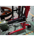Heavy Duty Drum Lifter And Rotator Tool For 55 Gallon Steel Or Plastic Barrels With Solid Steel Jaw Clamp Cradle And Polyurethane Wheels That Lift Spin And Move Up To 990 Pounds Super Easy close-up of hydraulic system and wheel assembly