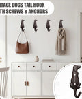 Kickass Cast Iron Dog Tail Hooks, Straight Up 4 Pack Wall Mount Leash Holders With Screws and Anchors displayed with bags and scarves.