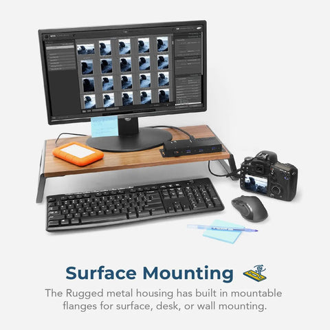 Computer setup featuring 4 Port USB 3.2 Gen 1 Industrial Hub in Rugged Metal Case with Screw Lock Cable Option connected to devices