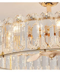 Close-up of Top Shelf Modern Ceiling Fan Chandelier Combining Invisible Blades With Slick Crystal Accents and Warm Pendant Lighting.