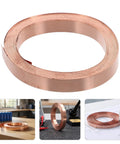 Straight Up Pure Copper Welding Strips For Ev Battery Packs And Power Modules Smooth Thin Copper Metal Roll displayed on workbench.
