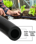 Half Inch Drip Irrigation Tubing 49.2 Feet Main Garden Watering Line in use with garden plants showing size specifications