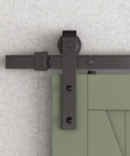 Sliding Barn Door Hangers J Shape 2 Pack Black Solid Steel With POM Wheels on track, showing door installation