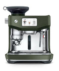 Oracle Jet Semi Automatic Espresso Machine Featuring Precise Heat Control Silky Milk Frothing Swipe Interface And Cold Brew Mode For Next Level Coffee Vibes At Home in green with touchscreen display.
