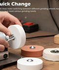 Hella Versatile Mini Bench Grinder Fitted With Three High Speed Buffing Wheels shown with interchangeable grinding wheels for easy use.