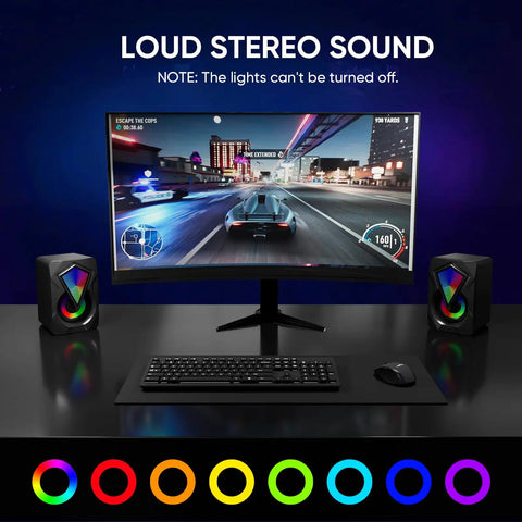 Desktop USB Powered 2.0 Computer Speakers With Volume Control And RGB LED Lights, Crisp Stereo Sound For PC, shown beside monitor