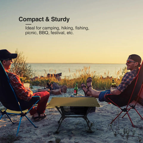 Dipper Camping Table Lightweight Portable Folding Table With Mesh Storage Net Adjustable High Low Heights on beach with two people
