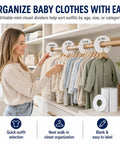 Woman organizing baby clothes with 30 Pack White Closet Dividers for Baby Clothes, No Fuss Easy Label System to Separate Sizes