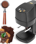 Commercial Electric Espresso Tamper Auto Fill For 58mm Portafilter With Adjustable Pressure Control Up To 66 Lbs Height Adjustable Stand Easy Clean in black beside coffee grounds and portafilter.