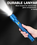 Ultra Bright Tactical Flashlight With 900 Lumen Zoomable Beam held showing adjustable focus and aluminum body with lanyard