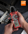 Digital Clamp Meter Multimeter With Auto-Ranging 4000 Counts For AC And DC Voltage And Current, Resistance, Capacitance, Frequency, Duty Cycle, Diode, Continuity, Live Wire NCV Test, Non Contact Voltage Detection, Pro Grade Tool For Pros And DIY in use on wiring panel