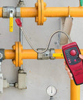 Using a Super Handy Portable Natural Gas Detector Sniffer for detecting combustible propane, methane fuel gas leaks on pipes.