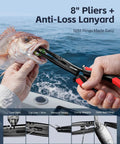 Using 8-inch pliers and lanyard from 7 Piece Fishing Tools Kit With Fillet Knife Split Ring Pliers Braid Scissors Fish Gripper 35 Inch Ruler Sharpener And Lanyard For Saltwater And Freshwater Go To Gear Gift For Men to hold fish on a boat.
