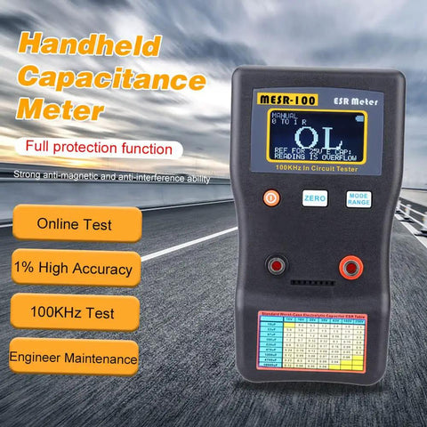 Pro Grade Capacitor ESR And Ohm Meter V2 with display and buttons for quick measurements, on a road background for contrast