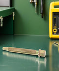 Heavy Duty Zinc Plated Lead Screw Replacement Rod For Auto Body Repair, Beefy Vise Clamp Screw For Mechanic Shops, Durable Bench Part That Keeps Auto Body Fixes Solid, High Strength Automotive Clamp Screw on green workbench