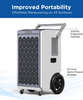 260 Pints Commercial Dehumidifier With Pump And Drain Hose For Basements And Large Spaces Like Warehouses, Heavy Duty Industrial Dehumidifier With Auto Defrost, featuring stylish ergonomic handle and 10-inch semi-pneumatic wheels for portability.