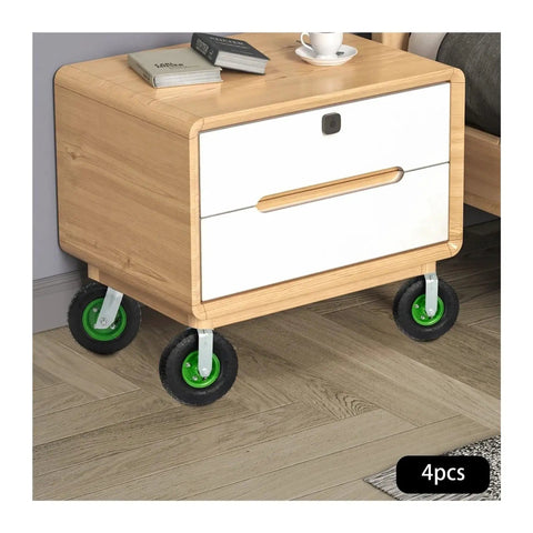 Heavy Duty 10 Inch Pneumatic Caster Set Four Piece Swivel And Rigid Wheels on a wooden nightstand with drawer.