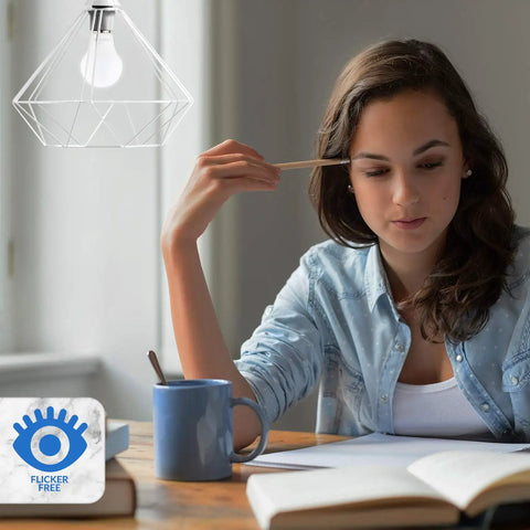 Woman studying under Pack Of 6 A19 LED Light Bulbs 60W Equivalent 5000K Bright White 800 Lumens 9W Replacement E26 Base lamp