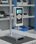 Digital Push Pull Force Gauge With Backlit Display And Peak Hold Pro Grade Tension And Compression Tester Unit Conversion In N Kg Lb 5N Capacity Portable AA Powered One Hand Operation Readouts mounted on test stand