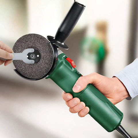 Heavy Duty Angle Grinder Wrench Set Compatible With 125 Mm And 150 Mm Tools Featuring Solid Steel Flats That Are Hella Rust Proof and Ride Or Die Tough For Every Shop Build in use with a green angle grinder.