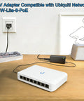 54V 1.1A DC Power Adapter For UniFi USW-Lite-8-PoE 8-Port Gigabit Switch, black adapter on desk