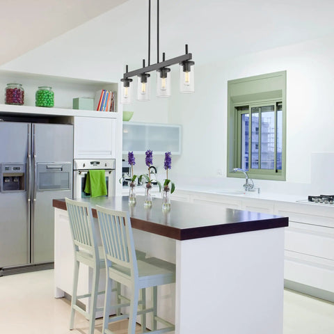 Kitchen with Winslett Linear Pendant In Matte Black With Slick Clear Ribbed Glass Shades for island lighting.