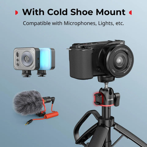 Versatile Extendable Mini Camera Tripod Selfie Stick with carabiner grip and mantis hook, cold shoe mount holding a camera