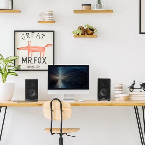 R33BT Bluetooth Bookshelf Speakers And 2.0 Powered Studio Monitors Black Wood Enclosure Pair on desk next to computer