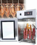 Game Changing Commercial Food Dehydrator Rocking A Sleek Rotary Drum Built Tough From Stainless Steel With Bulletproof Digital Controls and Spot On Temperature Adjustments For Whopping Thirty Kilogram Batches Ready To Roll showing internal view with various meats being dehydrated.