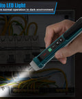 Hand holding Non Contact Voltage Tester with 9 Gear Adjustable Sensitivity, lighting up wires in electrical panel using LED flashlight.