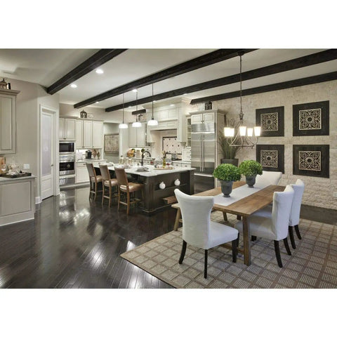Modern kitchen with one light pendant from Archie collection, clear prismatic glass, antique nickel finish over island and dining area.