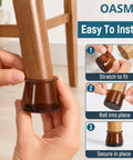 Hands installing Heavy Duty Silicone Chair Leg Protectors With Felt Bottoms on a wooden chair leg, showcasing easy application steps.