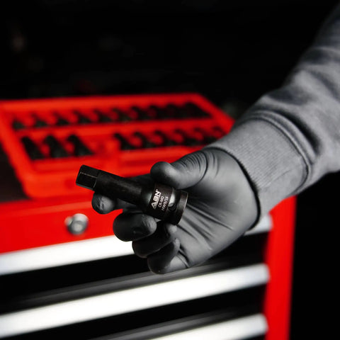 Hand holding a bit from 20 Piece Allen Hex Bit Set for 1/2 Inch Impact Driver, Chrome Molybdenum Steel SAE and Metric Bits with red case