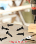 Kickass Quality 100 Pack Black Stainless Steel Wood Screws Flat Head Phillips Drive 8 X 1 2 Inch Rust Resistant Hardware For Pallet And Furniture Builds on wood surface