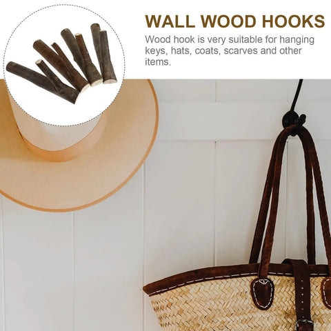 Straight Up Solid Natural Wood Wall Hooks For Bags And Hats Vintage Branch Coat Rack Entryway Storage with brown hat and bag.