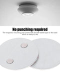 Hella Secure Magnetic Base For Smoke Detectors Drill Free Mounting Pads showing two heavy-duty magnetic pads with adhesive back for easy installation.