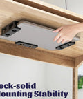 Slick Under Desk Laptop Mount Game Changer For Compact Home Offices featuring adjustable brackets and laptop placed securely.