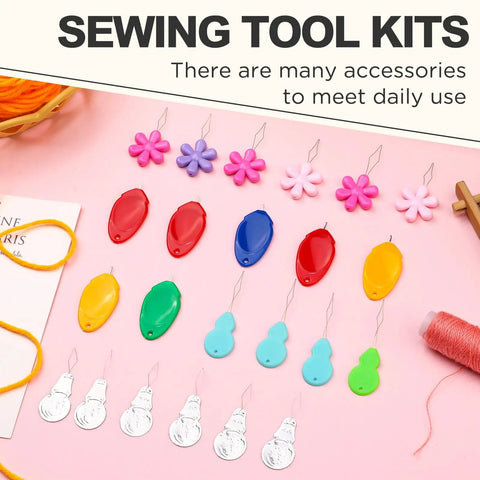 24 Piece Needle Threader Kit with Four Types and Clear Storage Box displayed on pink surface